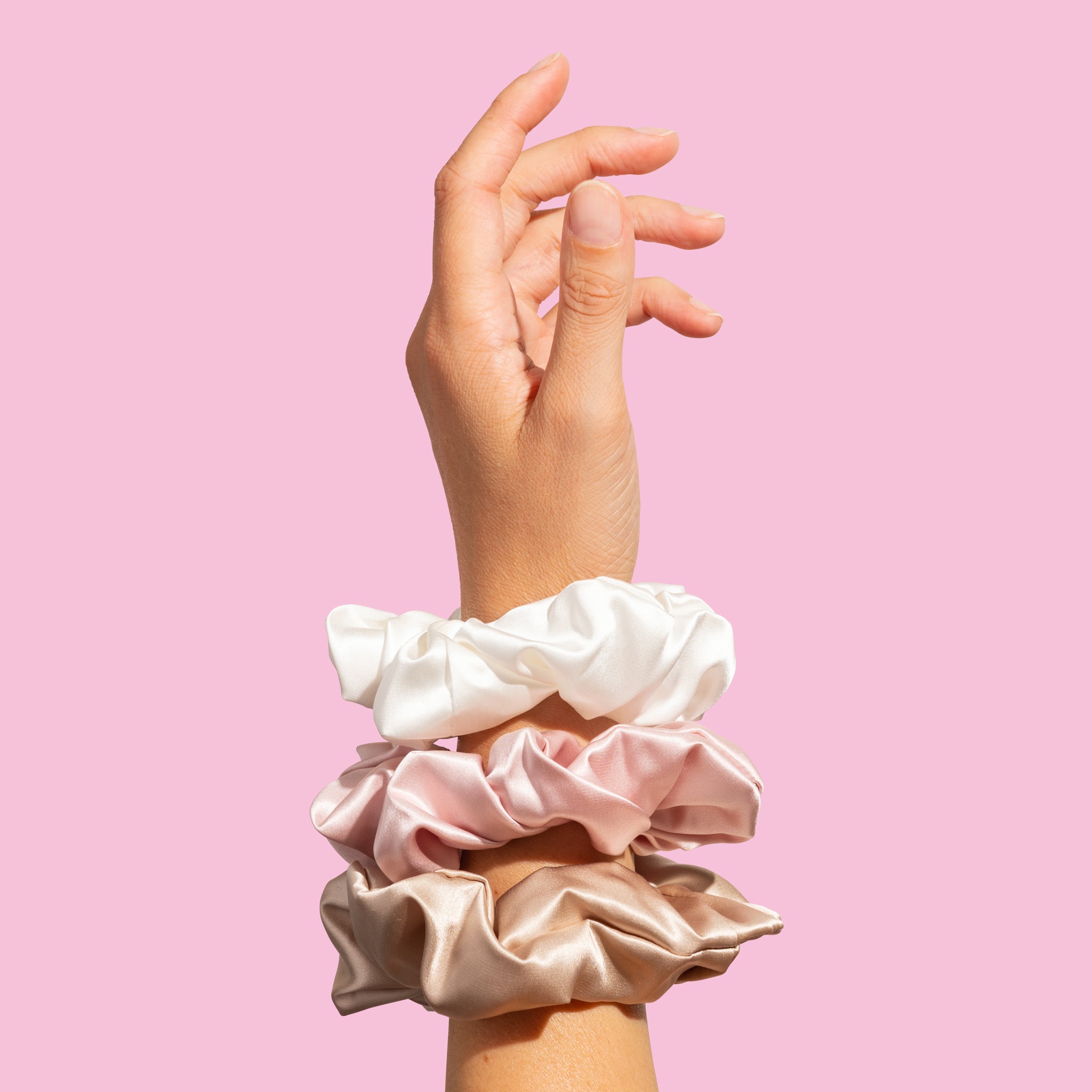 Hand wearing Silk Scrunchies Scrunchies The Lash Rehab